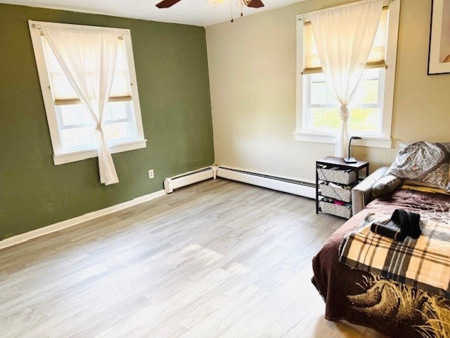 85 Ridgewood Lane, Unit 18 Gardner, MA 01440 - Photo 6 of 13 a living room with furniture and a window