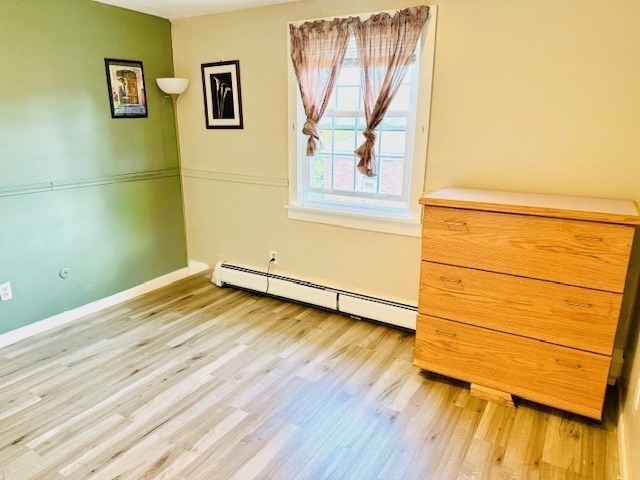 85 Ridgewood Lane, Unit 18 Gardner, MA 01440 - Photo 8 of 13 a view of a room with wooden floor and small space
