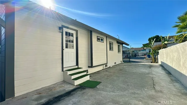 a view of backyard with large tree