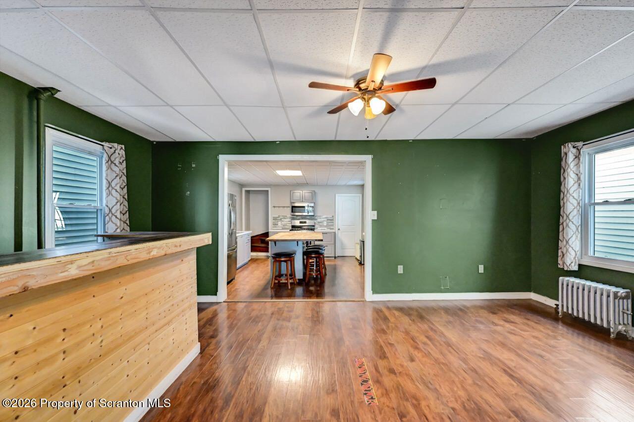 328 Ferdinand Street Scranton, PA 18508 - Photo 11 of 40 a view of a livingroom with kitchen and furniture