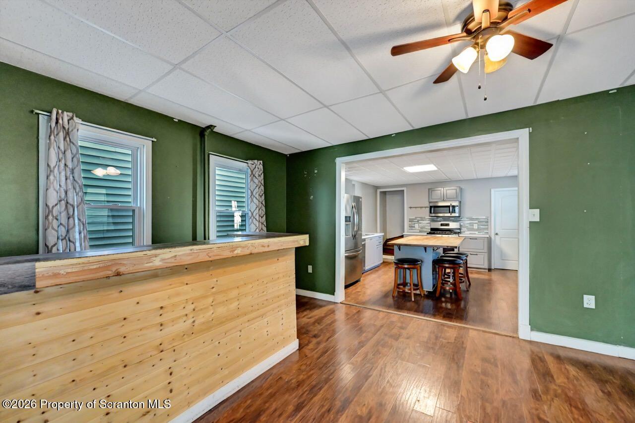 328 Ferdinand Street Scranton, PA 18508 - Photo 12 of 40 a view of a dining room with furniture window and wooden floor
