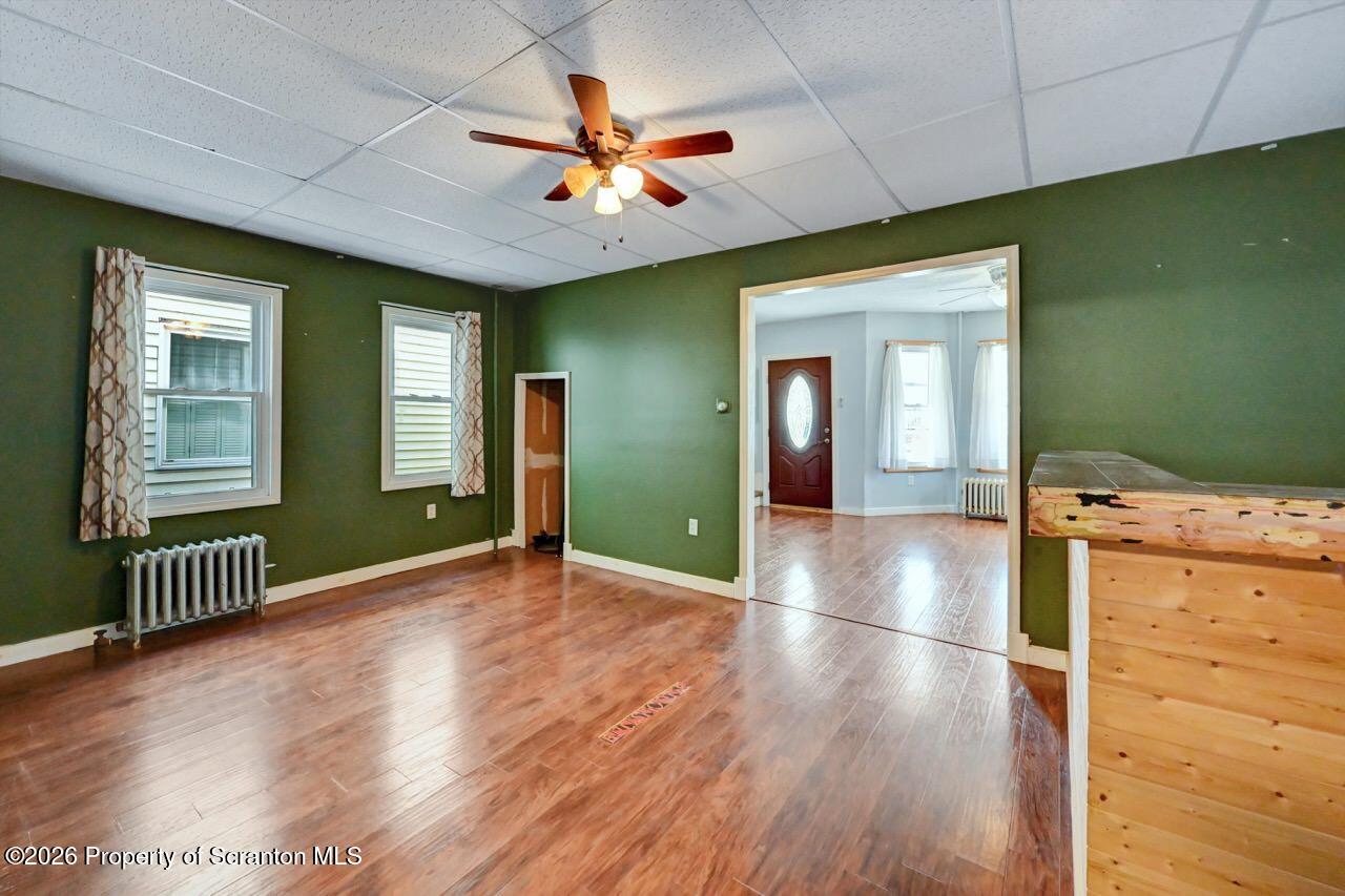 328 Ferdinand Street Scranton, PA 18508 - Photo 14 of 40 a view of livingroom with kitchen and hardwood floor