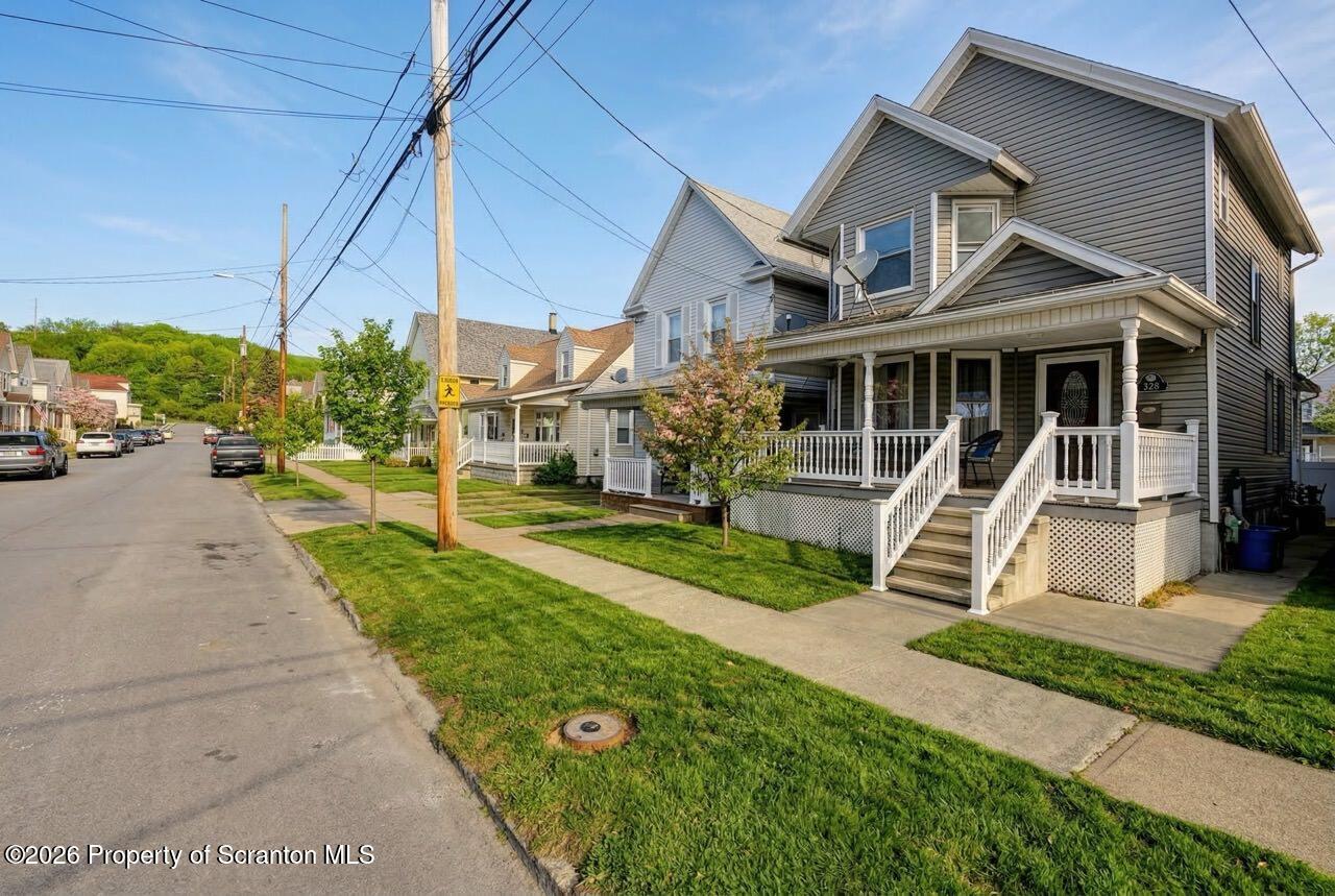 328 Ferdinand Street Scranton, PA 18508 - Photo 2 of 40 a view of a house with a yard