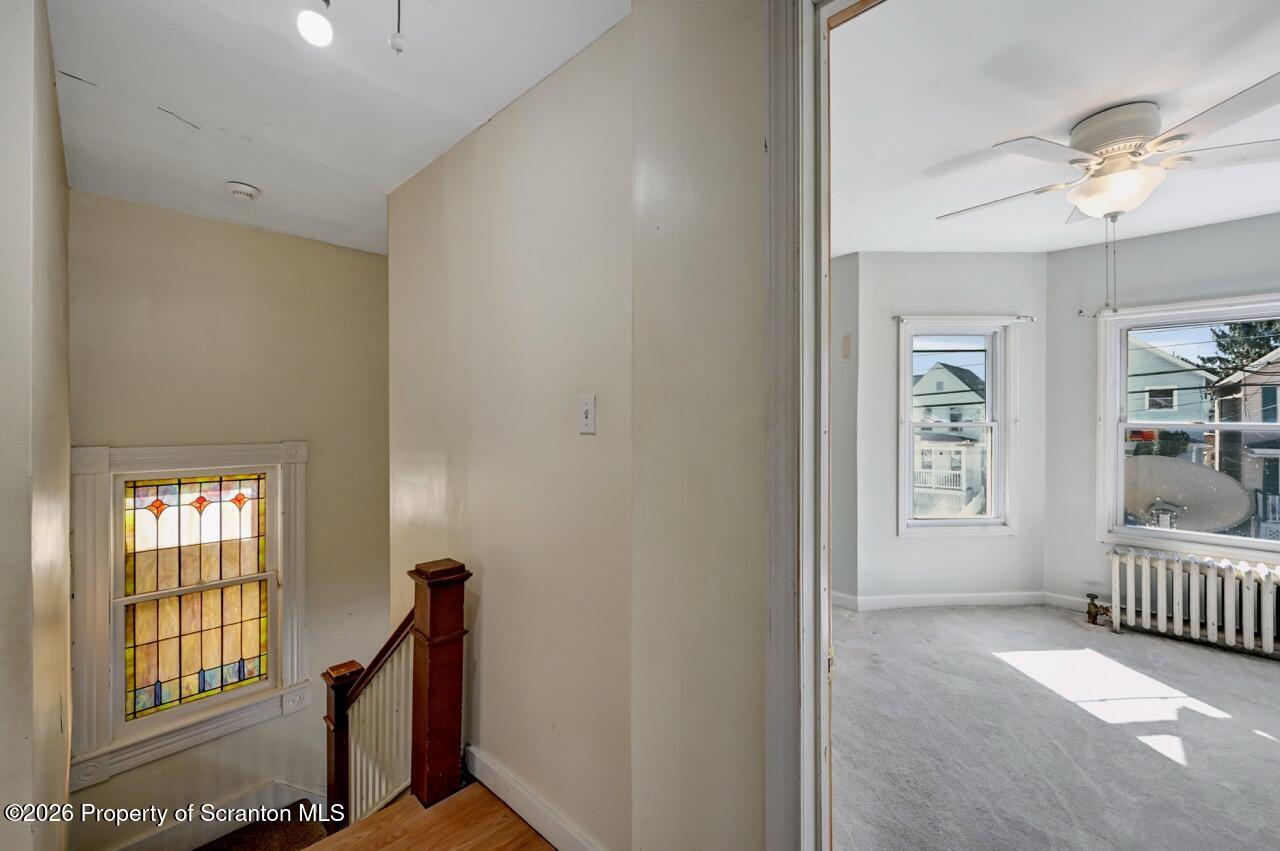 328 Ferdinand Street Scranton, PA 18508 - Photo 23 of 40 a view of an empty room with a window