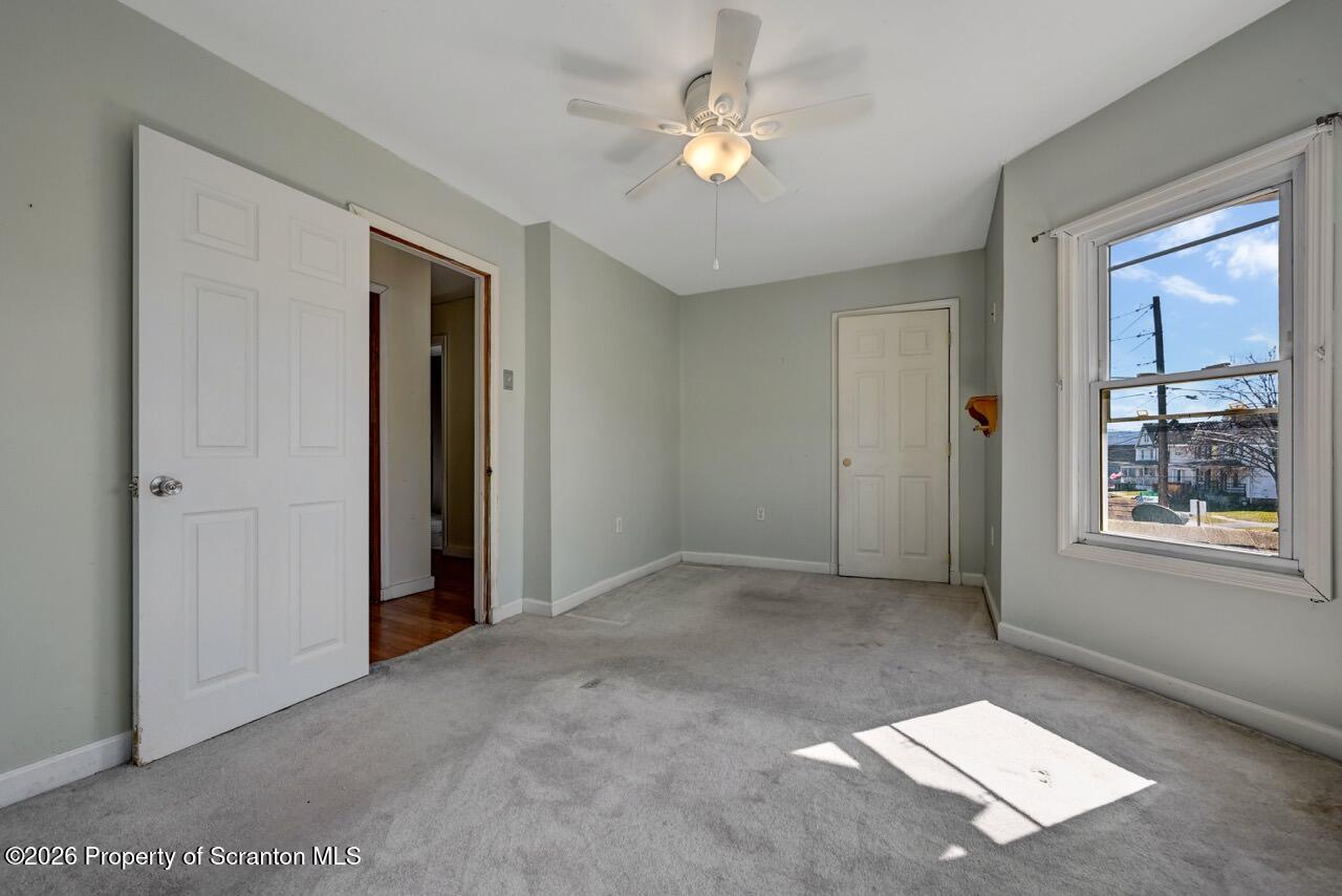 328 Ferdinand Street Scranton, PA 18508 - Photo 26 of 40 an empty room with windows and closet