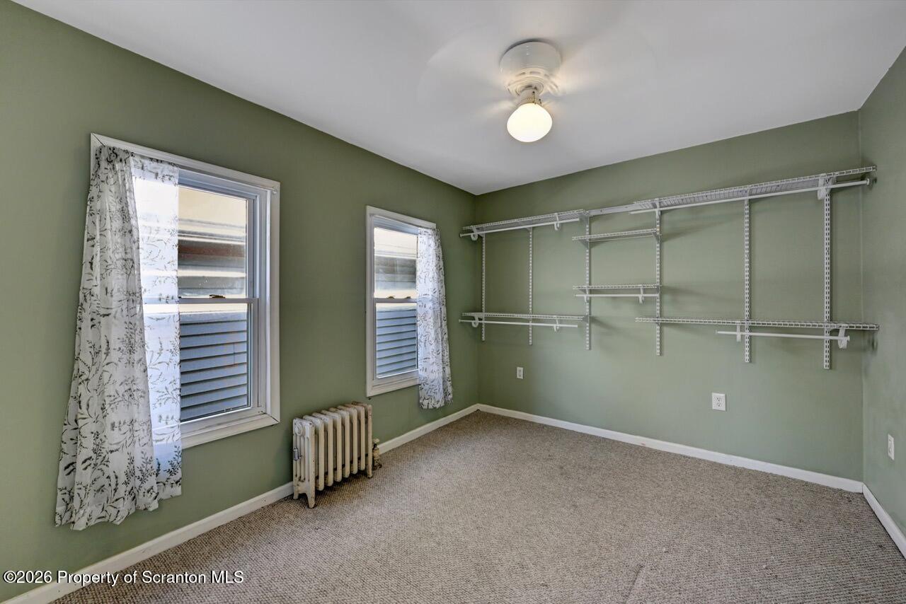 328 Ferdinand Street Scranton, PA 18508 - Photo 27 of 40 a view of an empty room with a window