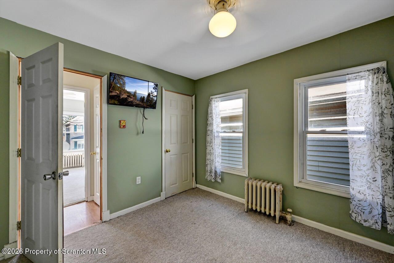 328 Ferdinand Street Scranton, PA 18508 - Photo 28 of 40 a view of livingroom with furniture and windows
