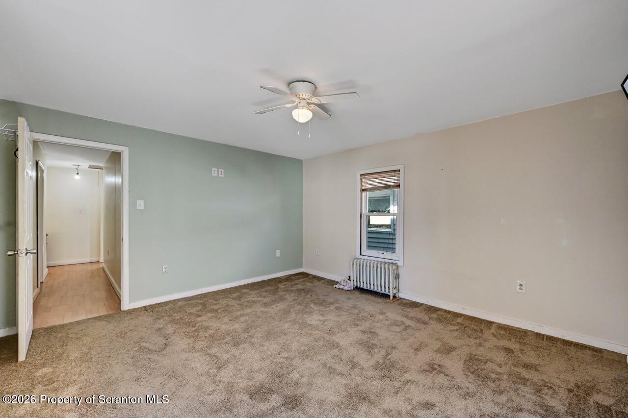 328 Ferdinand Street Scranton, PA 18508 - Photo 32 of 40 an empty room with fan and windows
