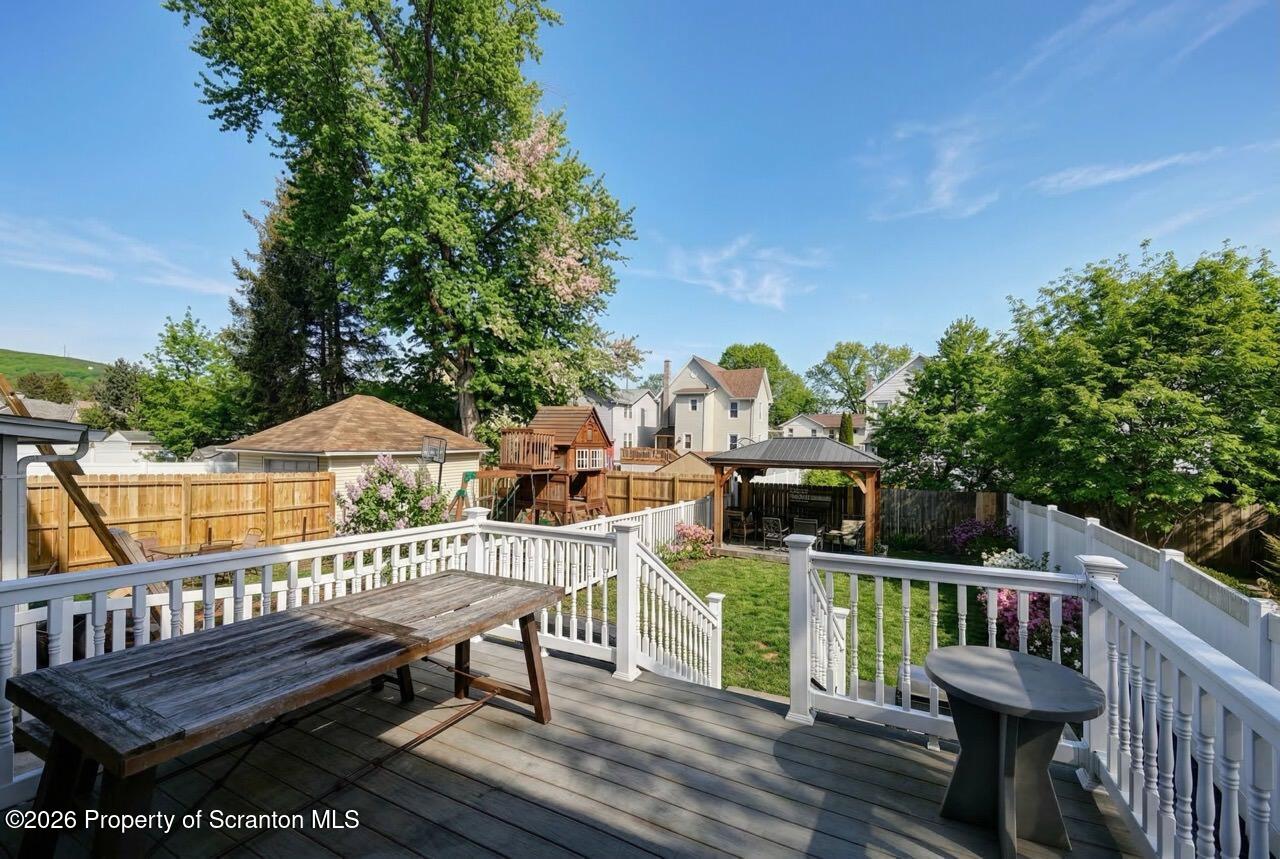 328 Ferdinand Street Scranton, PA 18508 - Photo 37 of 40 a view of a deck with furniture and garden