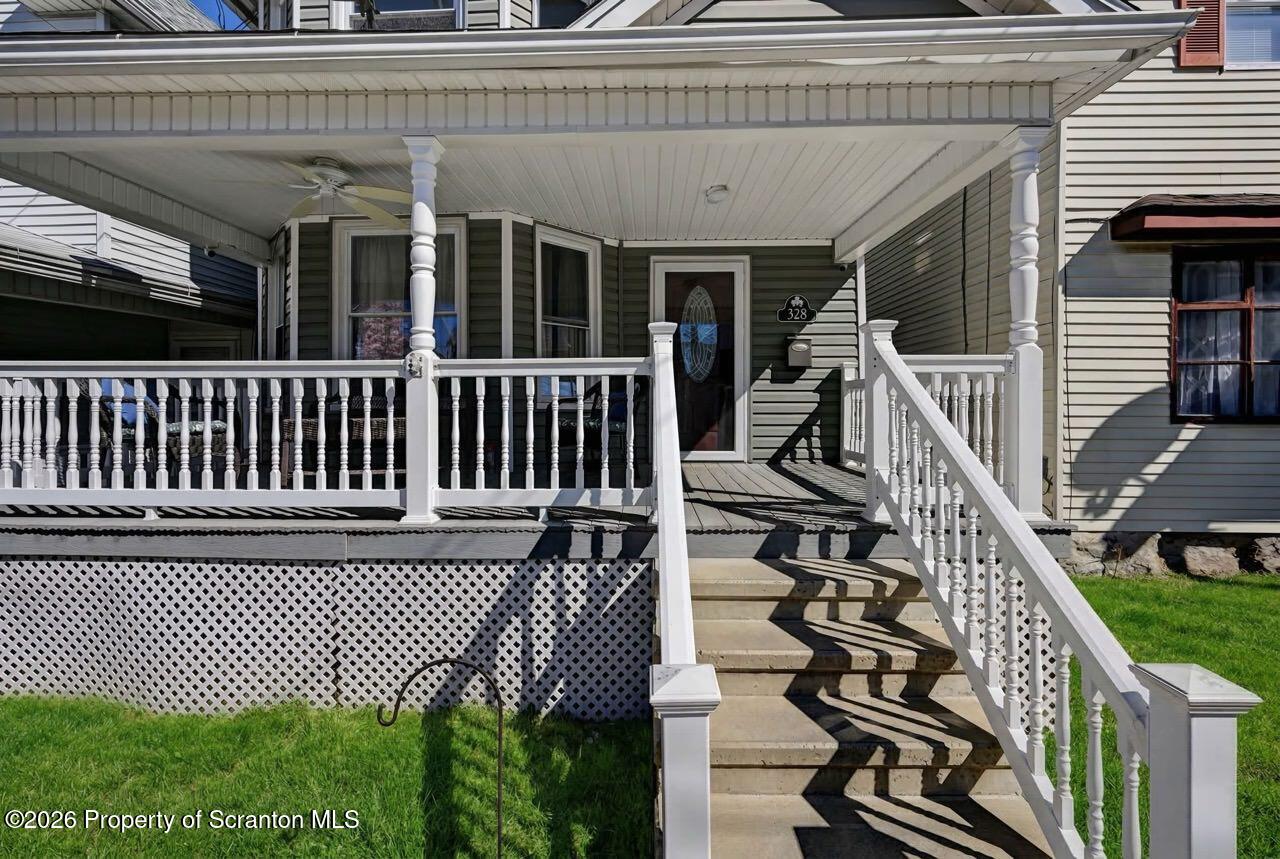 328 Ferdinand Street Scranton, PA 18508 - Photo 5 of 40 a view of a balcony with wooden floor