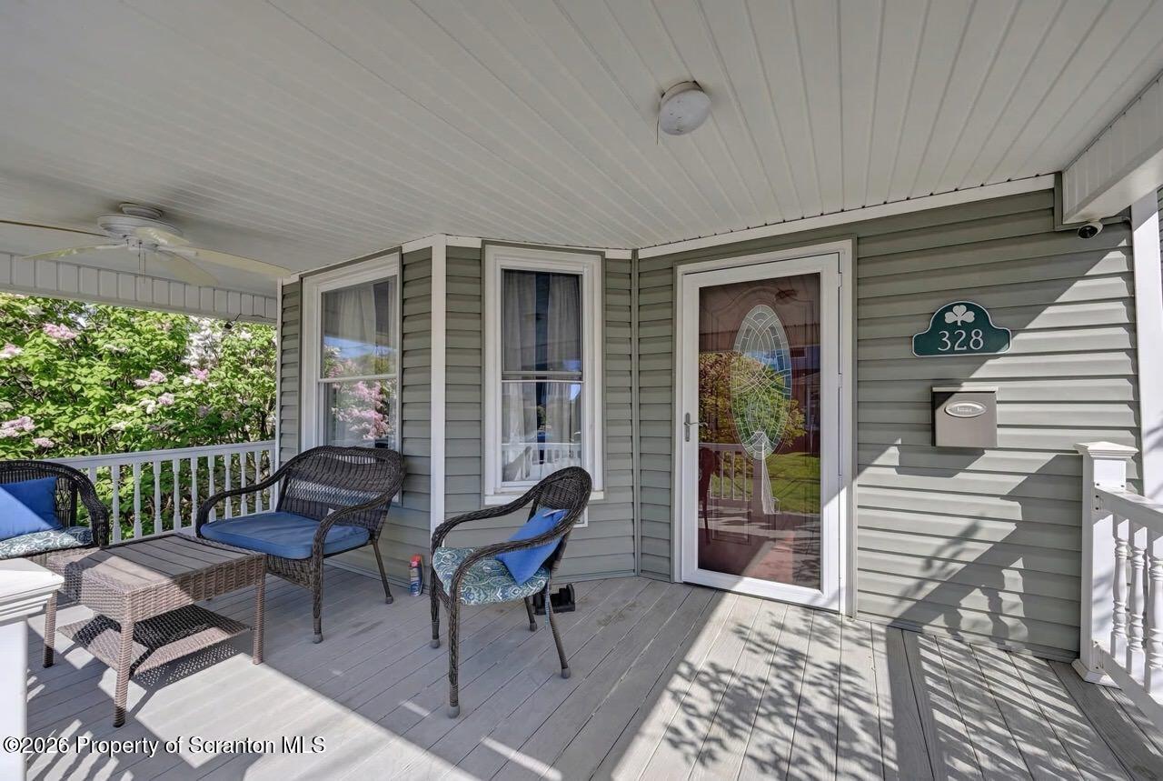 328 Ferdinand Street Scranton, PA 18508 - Photo 6 of 40 a balcony with furniture and a potted plant