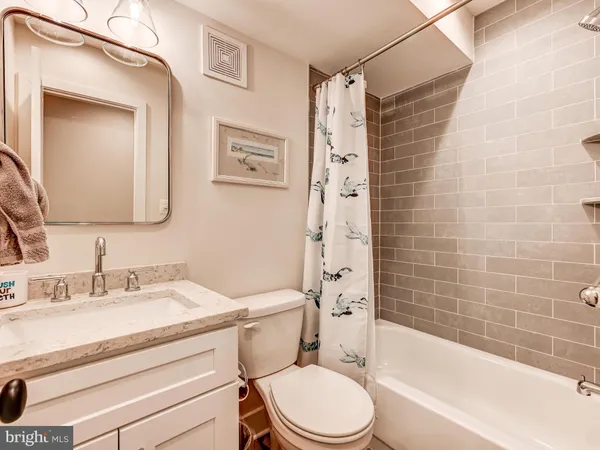 a room with gym equipment and windows