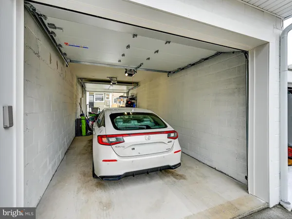 a view of a house with backyard and porch