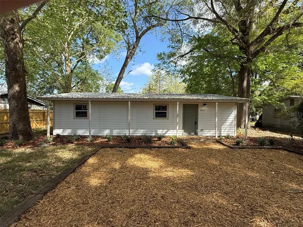 front view of house with a yard