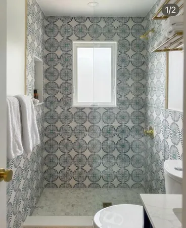 a bathroom with a toilet and a sink