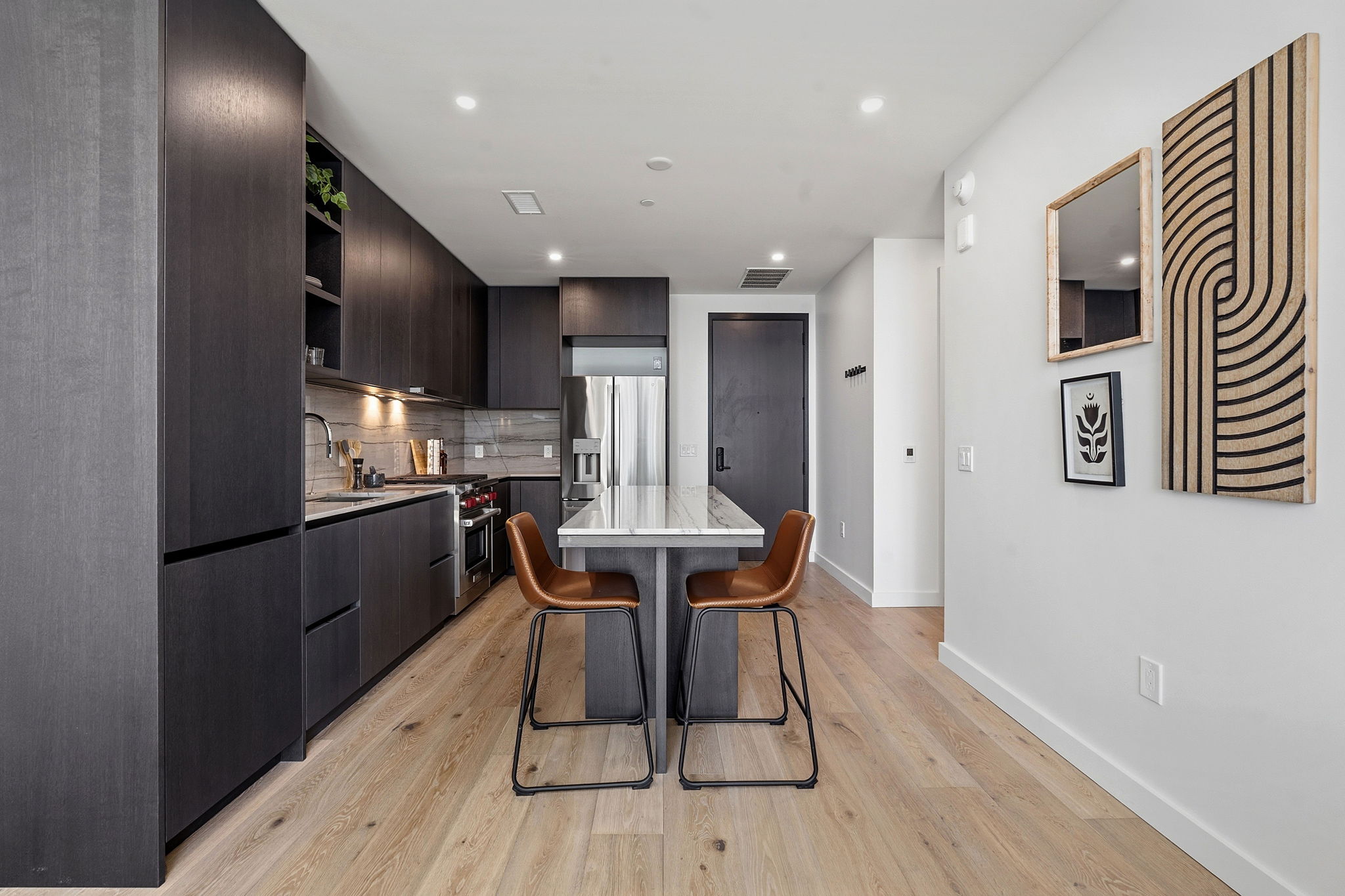 610 Davis Street, Unit 3004 Austin, TX 78701 - Photo 14 of 40 Dining room featuring light wood-style floors and recessed lighting