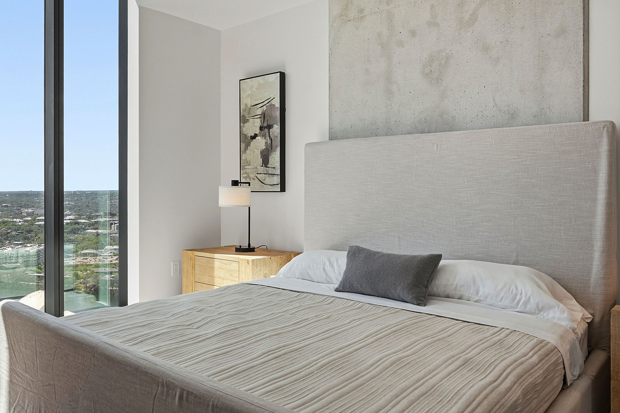 610 Davis Street, Unit 3004 Austin, TX 78701 - Photo 20 of 40 Bedroom with expansive windows and access to outside