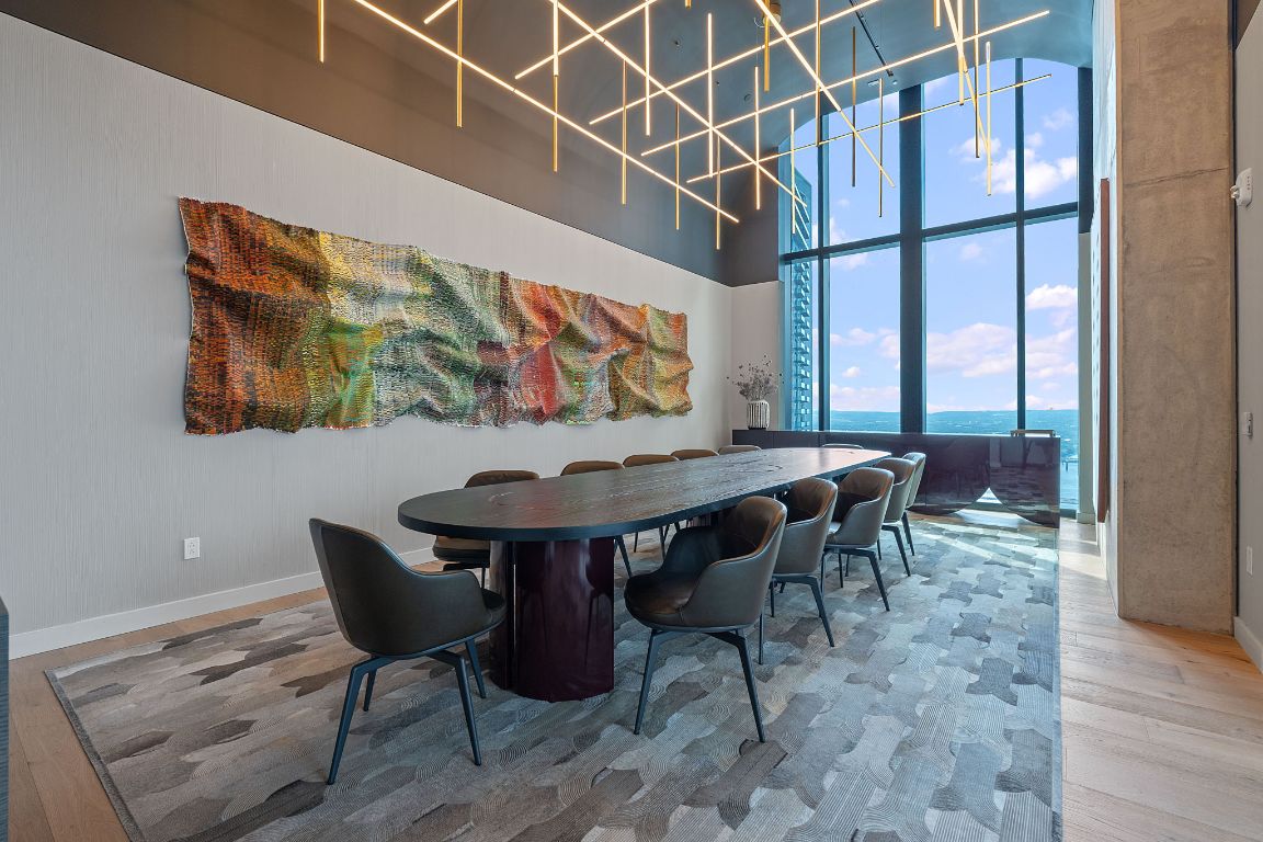 610 Davis Street, Unit 3004 Austin, TX 78701 - Photo 37 of 40 a view of a dinning table and chairs in the room
