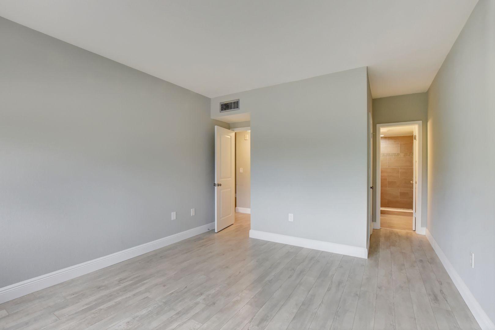 290 West Palmetto Park Road, Unit 304 Boca Raton, FL 33432 - Photo 11 of 27 wooden floor in an empty room