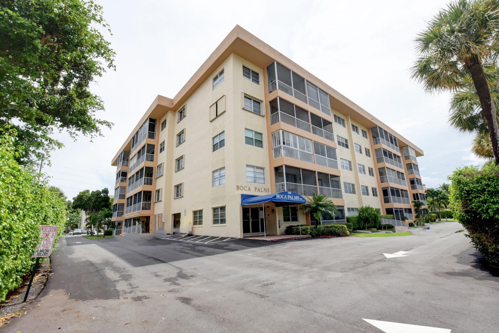 290 West Palmetto Park Road, Unit 304 Boca Raton, FL 33432 - Photo 14 of 27 a view of a tall building next to a road