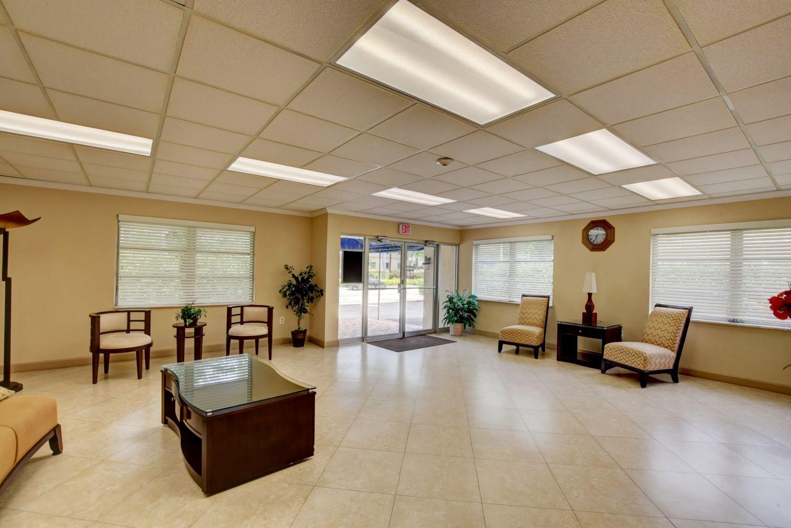 290 West Palmetto Park Road, Unit 304 Boca Raton, FL 33432 - Photo 16 of 27 a living room with furniture