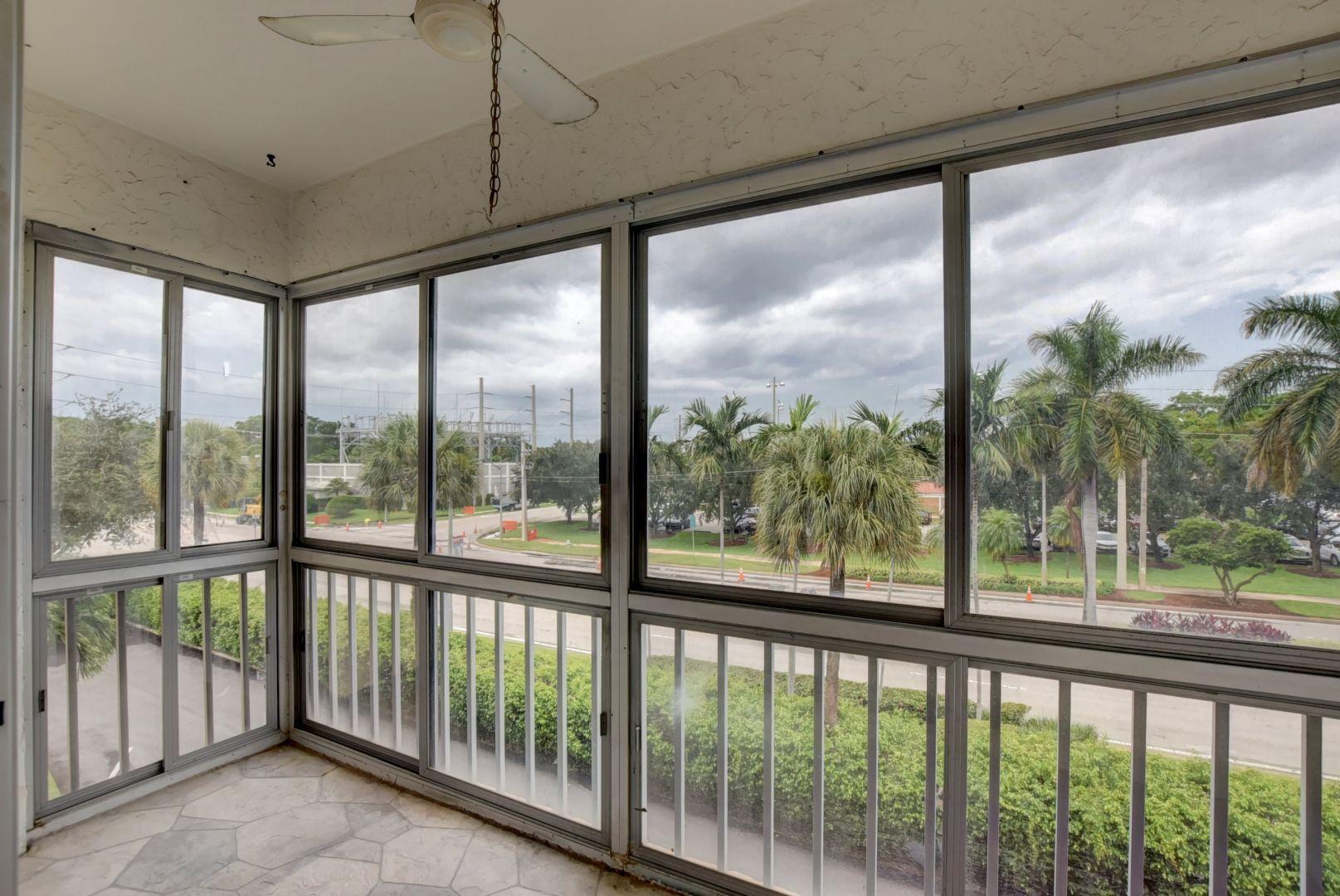 290 West Palmetto Park Road, Unit 304 Boca Raton, FL 33432 - Photo 19 of 27 a view of a city street from a balcony