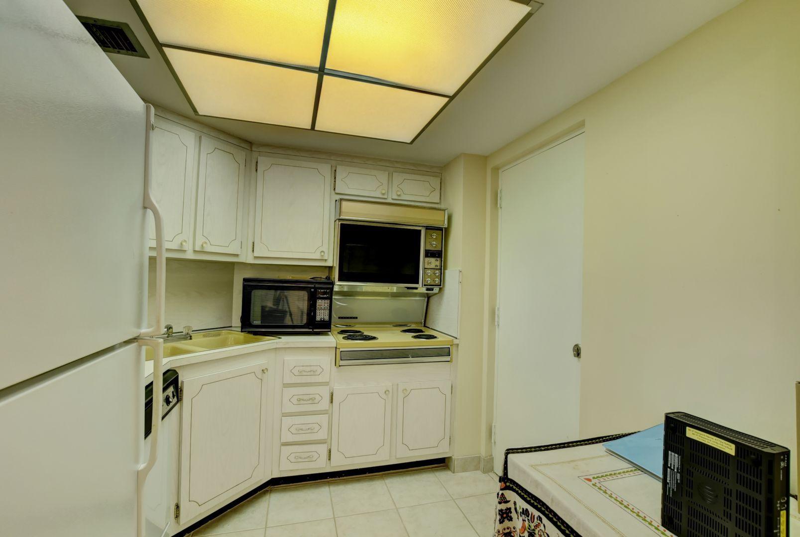 290 West Palmetto Park Road, Unit 304 Boca Raton, FL 33432 - Photo 25 of 27 a room with storage and utility