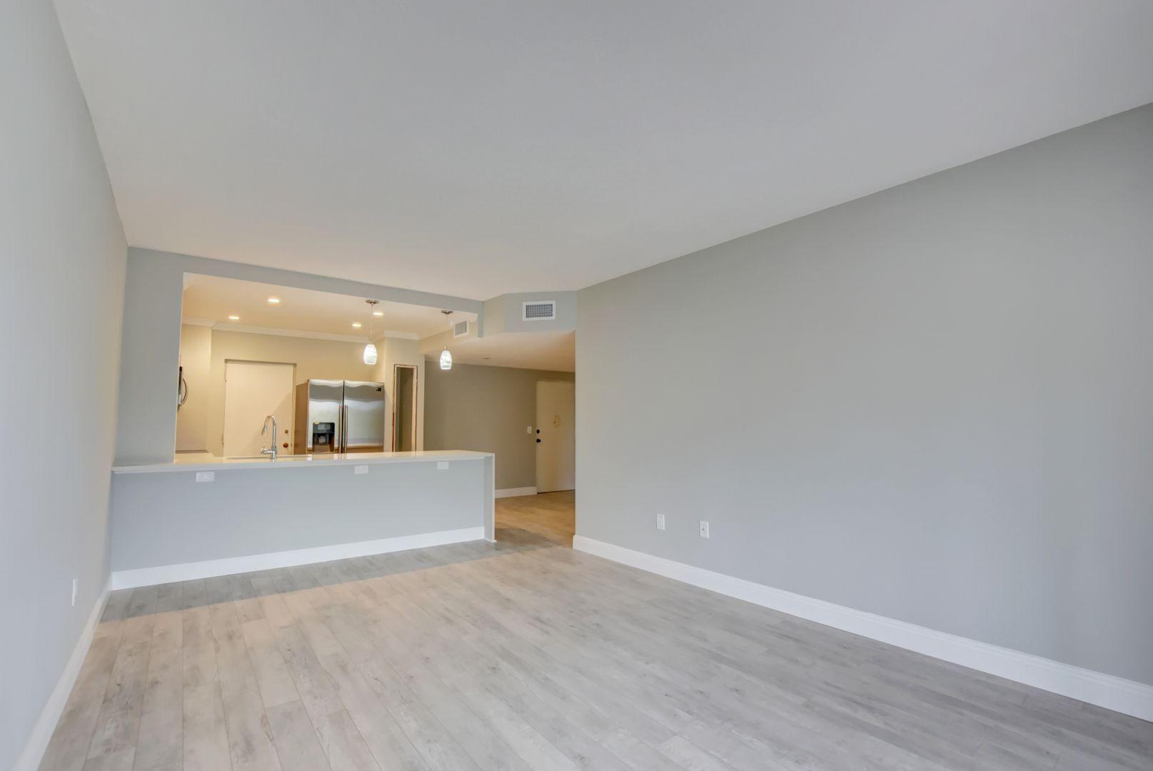 290 West Palmetto Park Road, Unit 304 Boca Raton, FL 33432 - Photo 4 of 27 wooden floor in an empty room