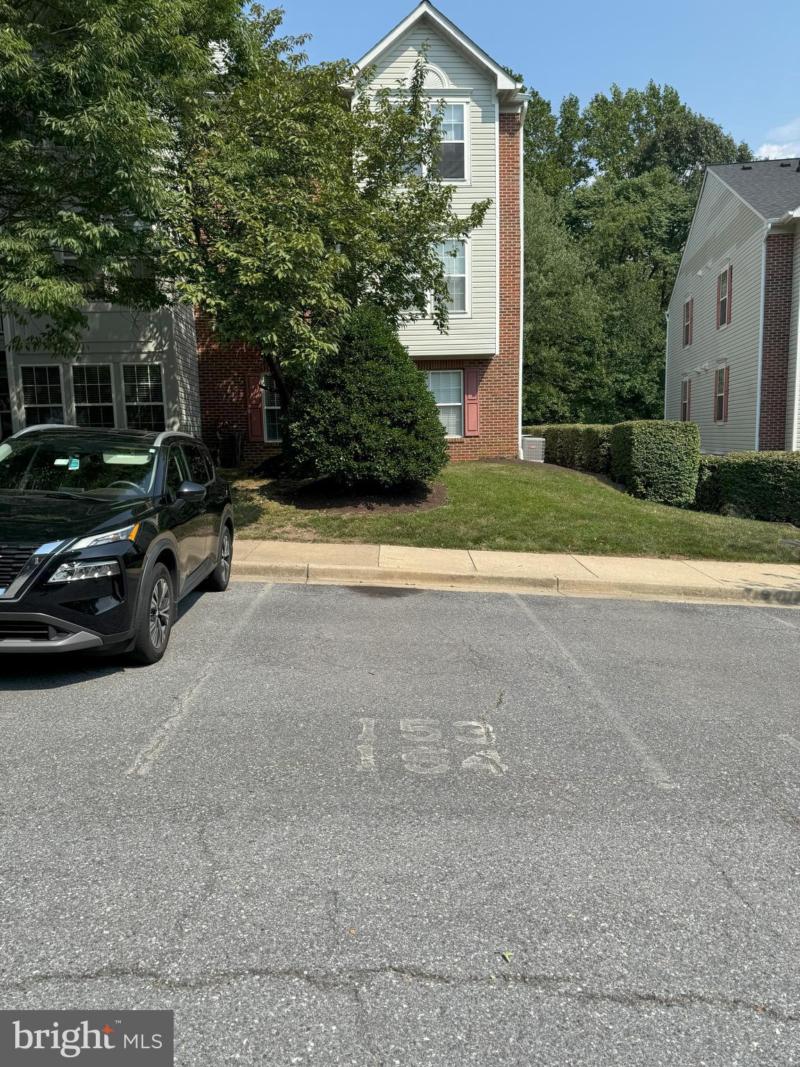 25905 Ridge Manor Drive, Unit C Damascus, MD 20872 - Photo 13 of 13 a view of a car parked on the side of a road