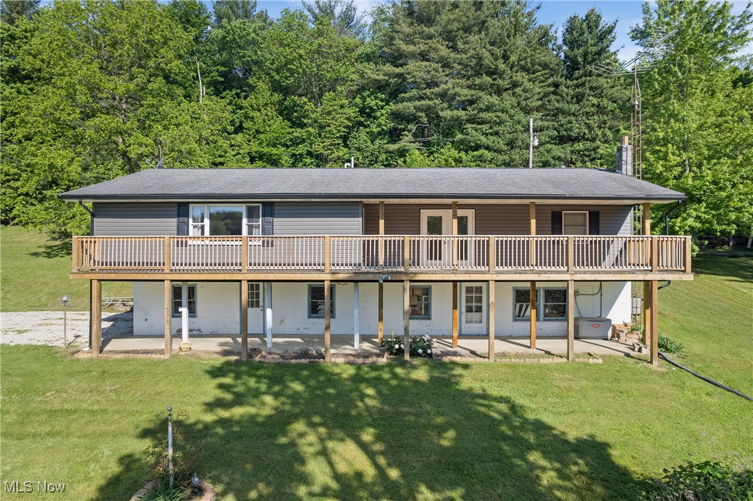 258 Walnut Road Southwest Dellroy, OH 44620 - Photo 23 of 33 Back of property, deck and covered patio area