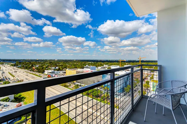 a view of a hallway with washer and dryer