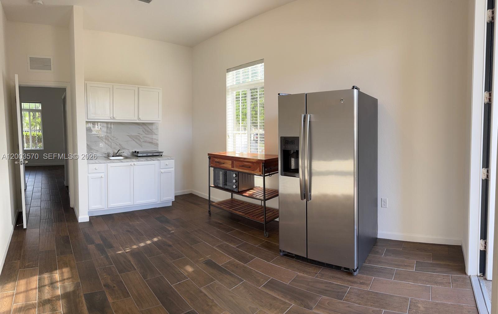 14237 Southwest 274th Street Homestead, FL 33032 - Photo 7 of 19 Living and Dining area
