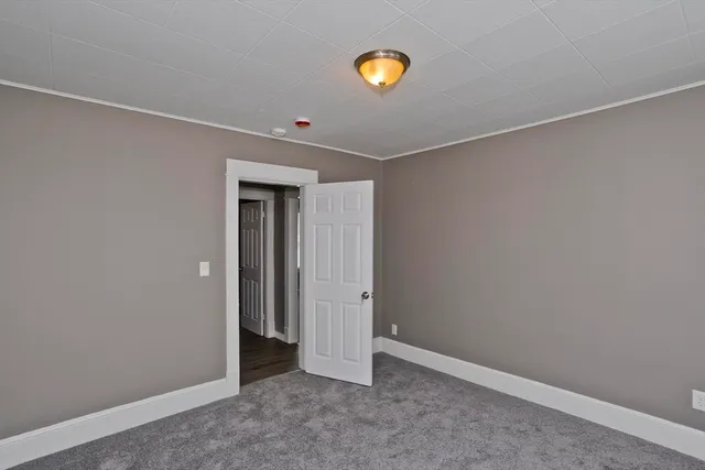 a bathroom with a shower and a sink