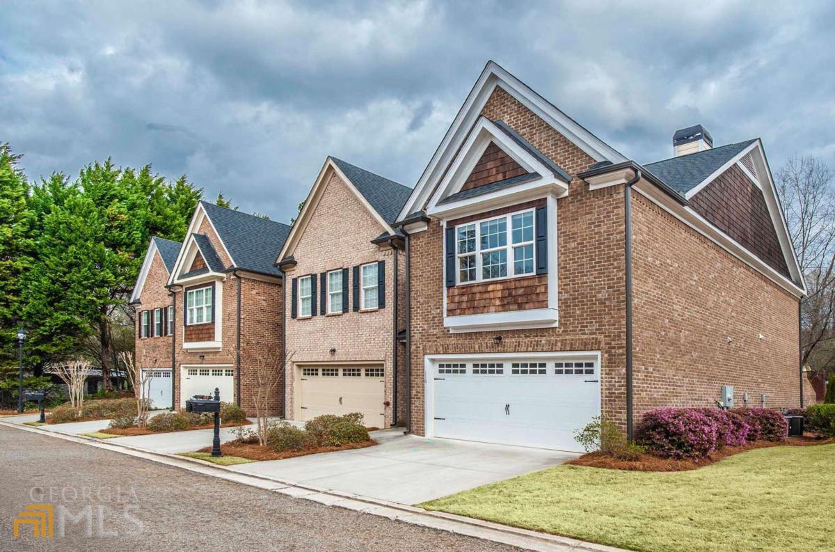 110 Elliot Circle Watkinsville, GA 30677 - Photo 1 of 1 a view of street along with house and trees