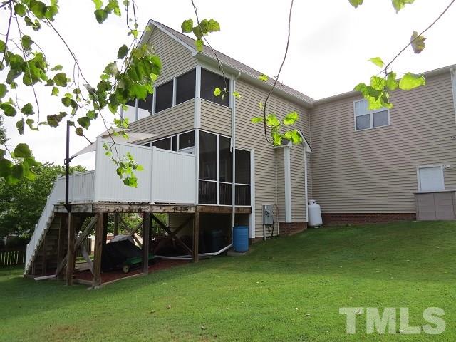 235 Steve Ridge Willow Spring, NC 27592 - Photo 18 of 25 a view of a house with a backyard