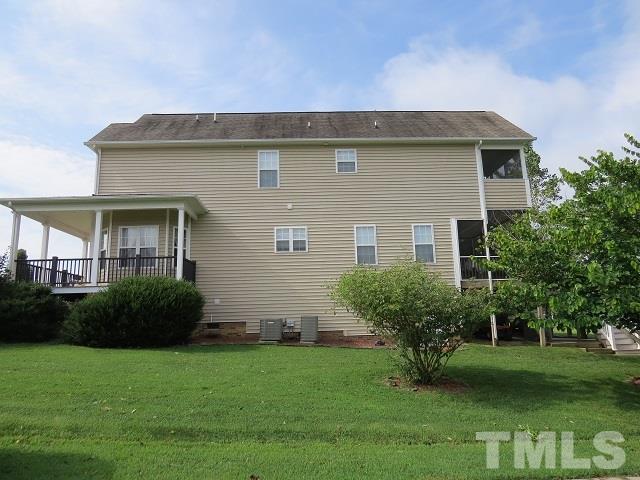 235 Steve Ridge Willow Spring, NC 27592 - Photo 21 of 25 a view of a house with a garden