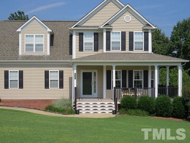 235 Steve Ridge Willow Spring, NC 27592 - Photo 25 of 25 a front view of a house with a yard