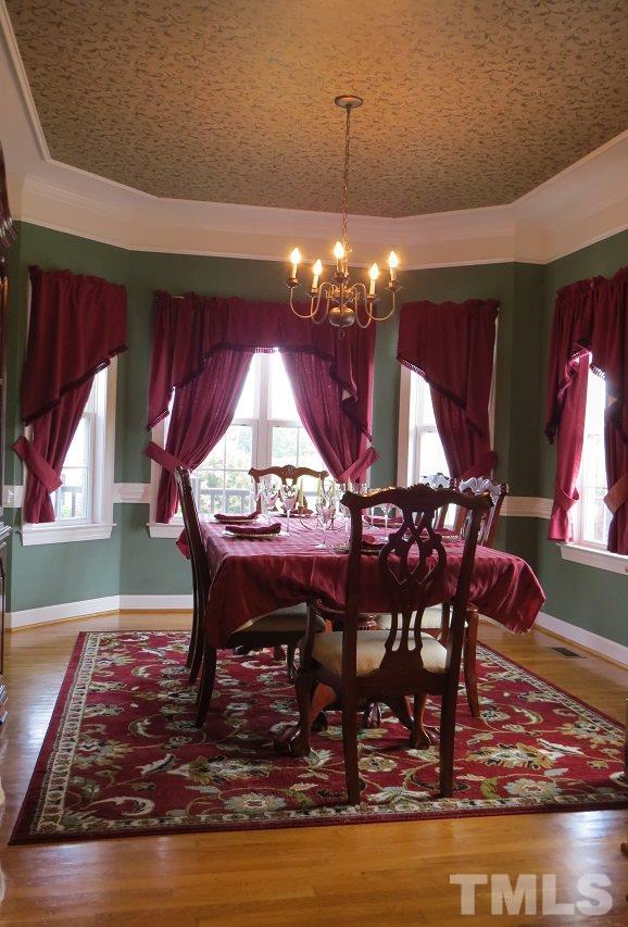 235 Steve Ridge Willow Spring, NC 27592 - Photo 7 of 25 a view of a dining room with furniture