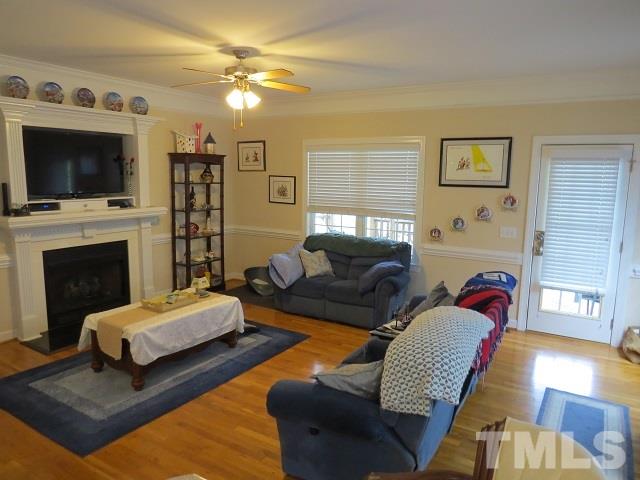 235 Steve Ridge Willow Spring, NC 27592 - Photo 10 of 25 a living room with furniture fireplace and flat screen tv