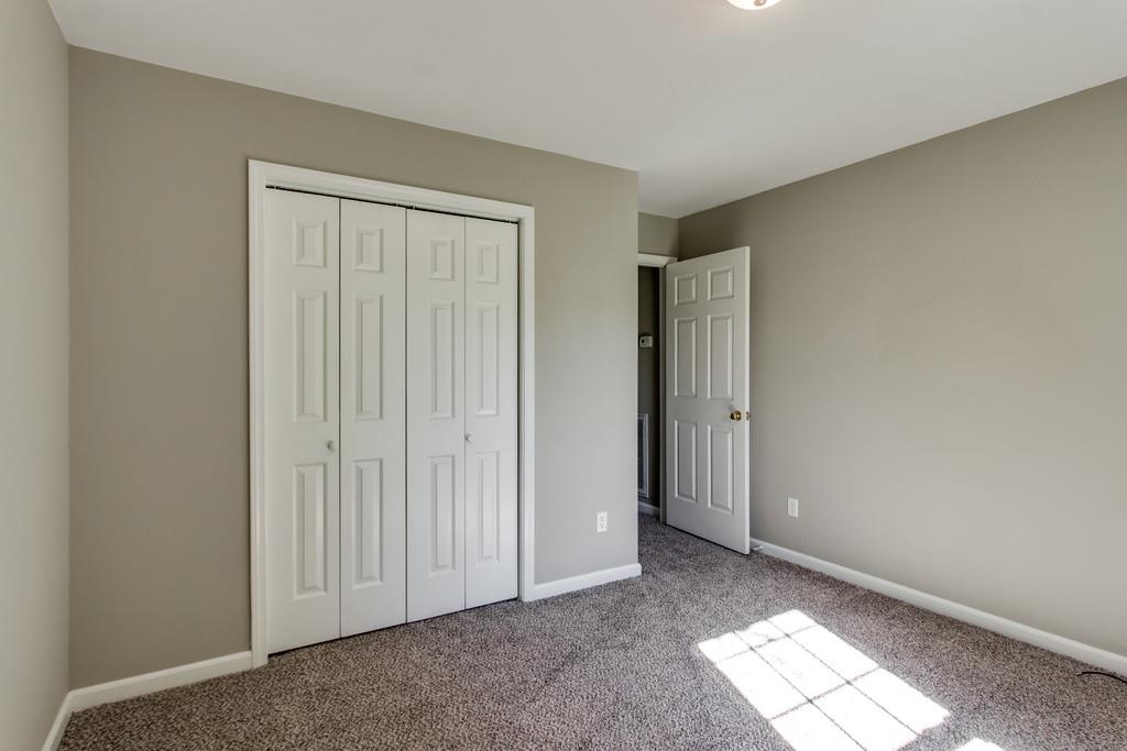 7566 Cherokee Hills Road Fairview, TN 37062 - Photo 22 of 30 an empty room with windows