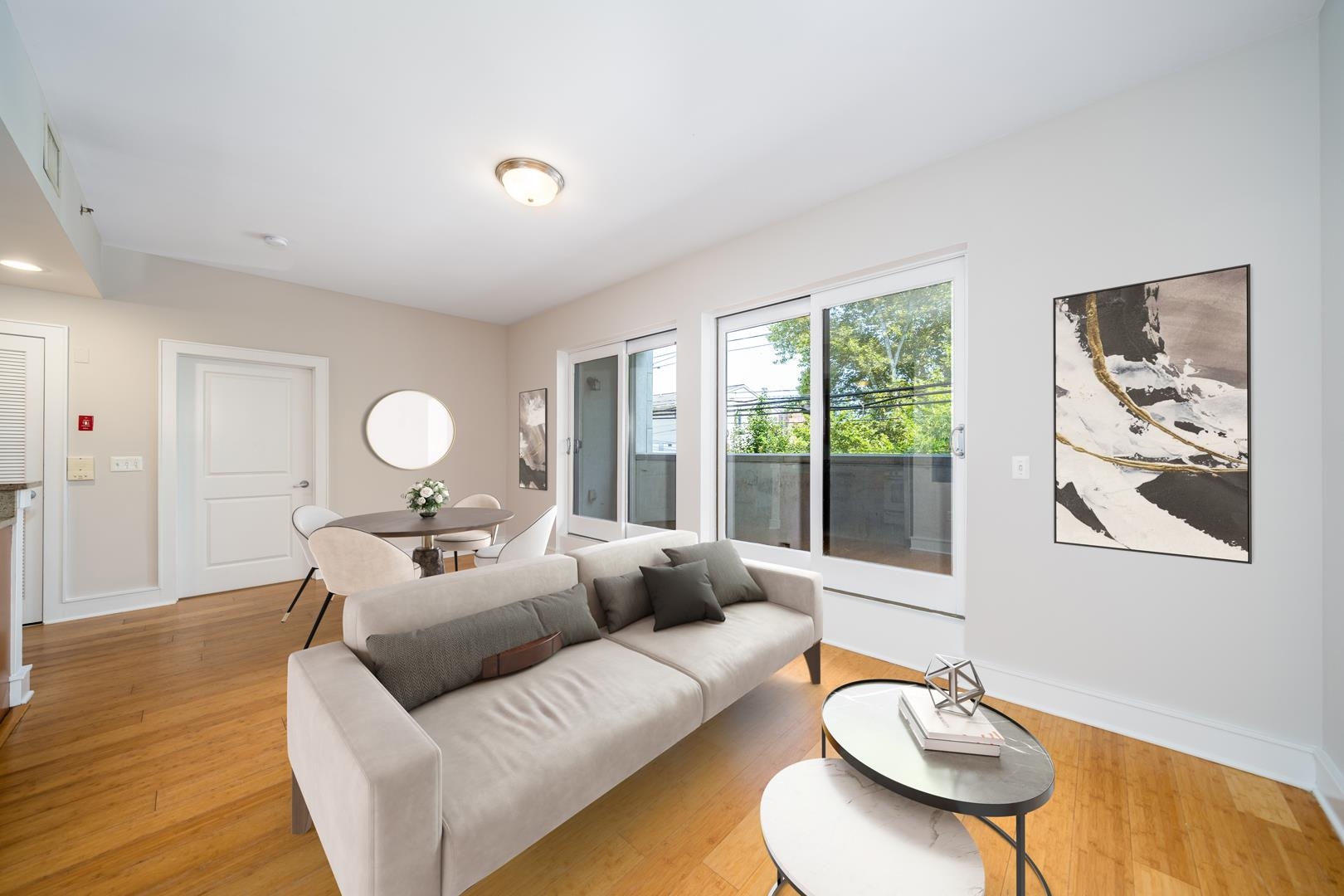 a living room with furniture and a large window