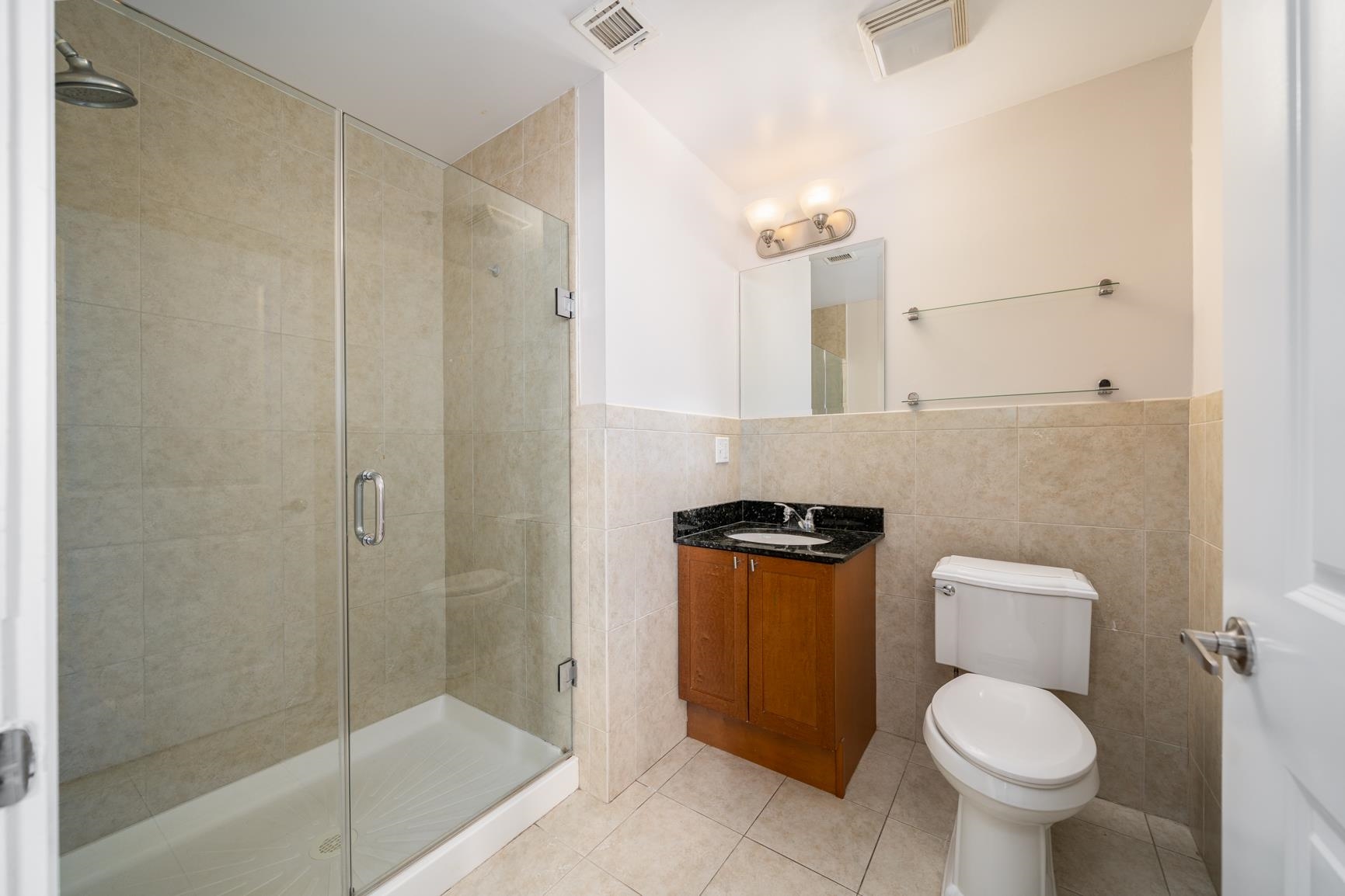 924 Jefferson Street, Unit 2A Hoboken, NJ 07030 - Photo 11 of 20 a bathroom with a toilet and a shower