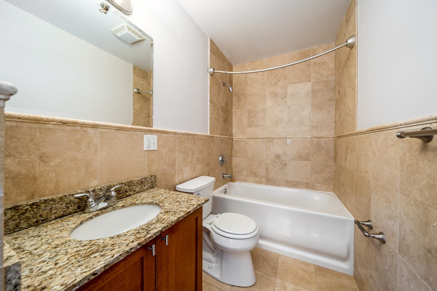 924 Jefferson Street, Unit 2A Hoboken, NJ 07030 - Photo 14 of 20 a bathroom with a granite countertop sink toilet and shower