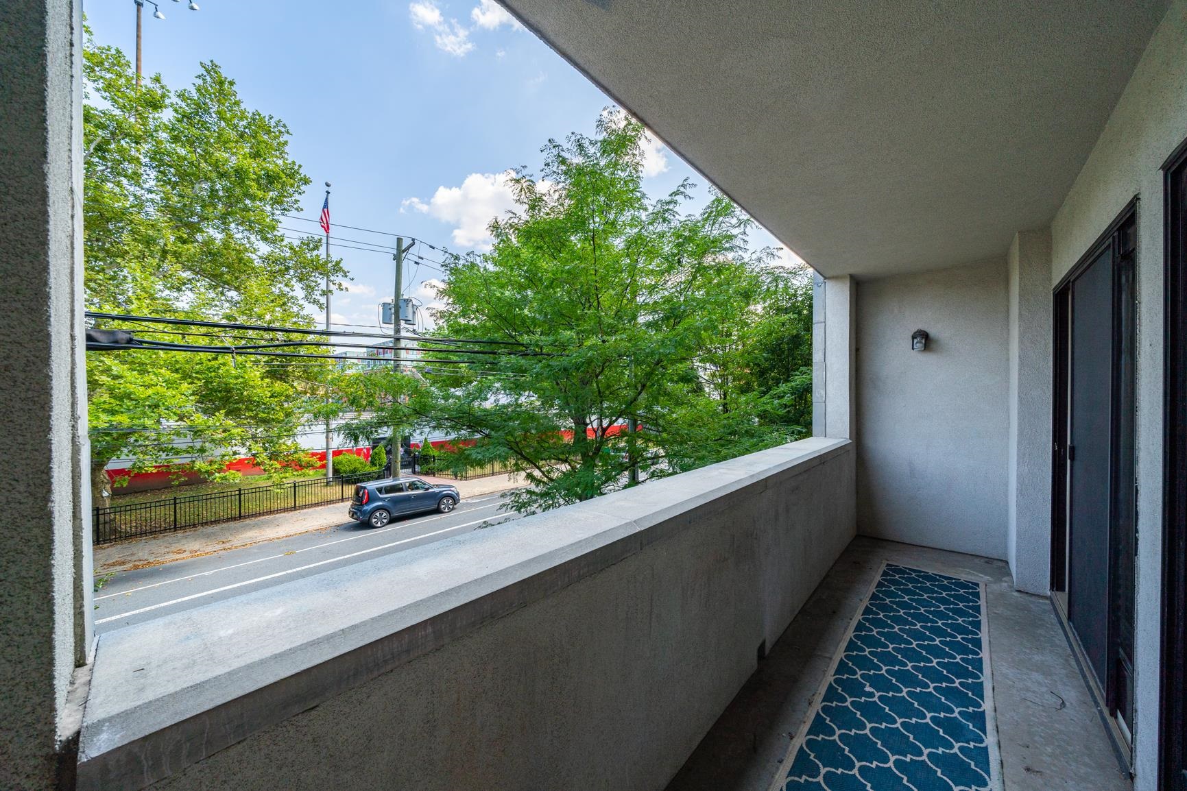 924 Jefferson Street, Unit 2A Hoboken, NJ 07030 - Photo 16 of 20 a view of a glass door with a outdoor space