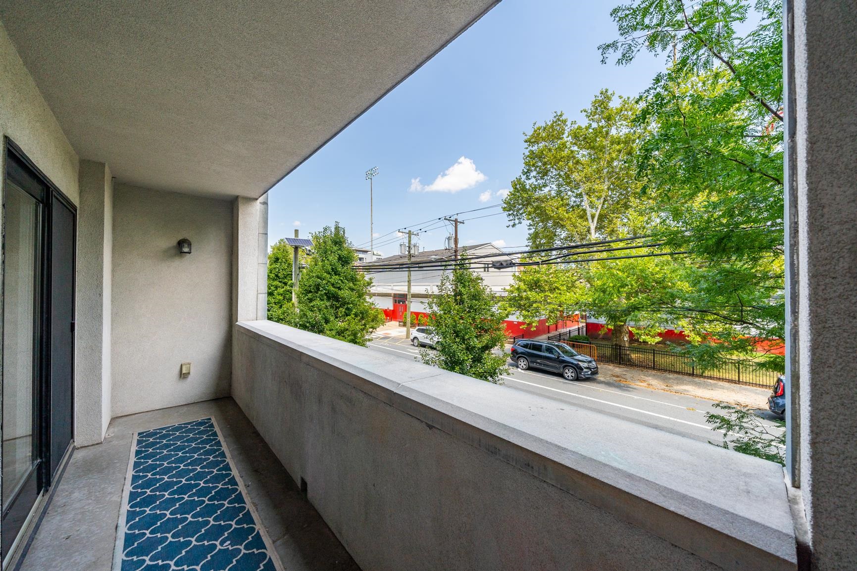 924 Jefferson Street, Unit 2A Hoboken, NJ 07030 - Photo 17 of 20 a view of a potted flower in a corridor