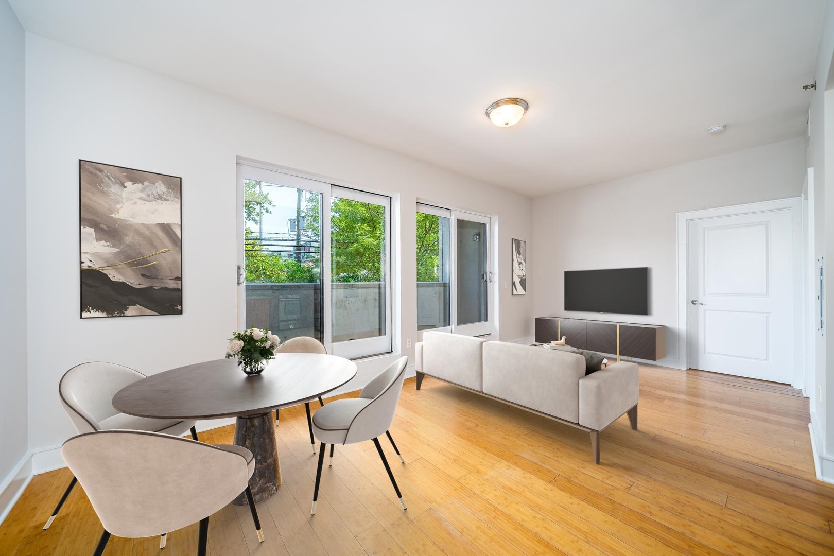 924 Jefferson Street, Unit 2A Hoboken, NJ 07030 - Photo 2 of 20 a living room with furniture and a table
