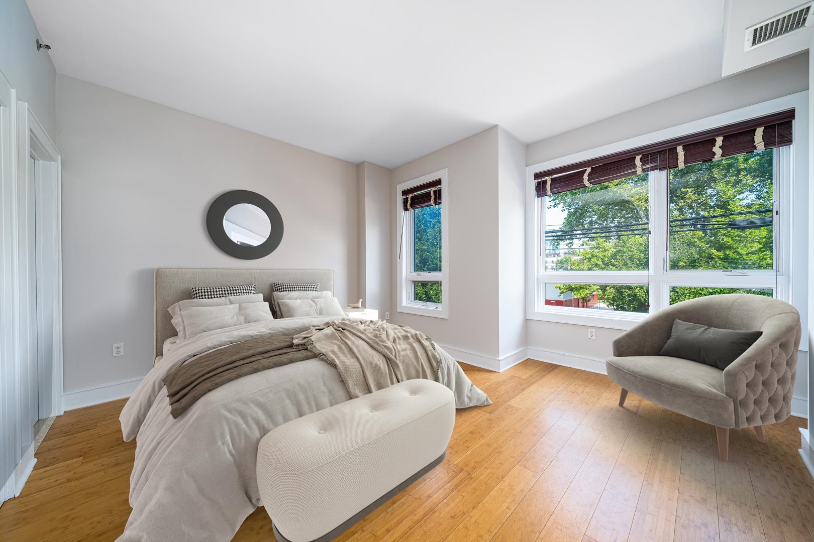 924 Jefferson Street, Unit 2A Hoboken, NJ 07030 - Photo 8 of 20 a bedroom with furniture and a large window