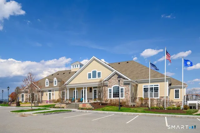 a view of swimming pool with a patio