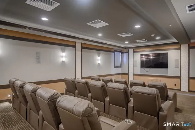 a view of a brick wall and roof deck