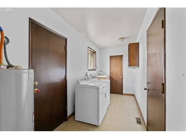 a bathroom with a sink and mirror